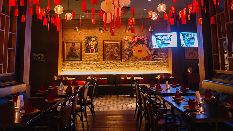 Chow's colourful dining room with red lanterns