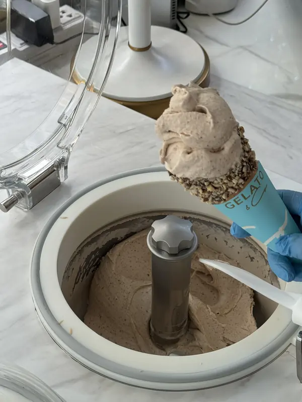 Fresh gelato being churned in the machine