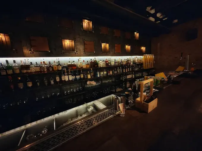 The Iron Fairies' long bar lined with bottles